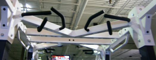 Pull-ups using the pull-up handles on Hammer Strength rack staton
