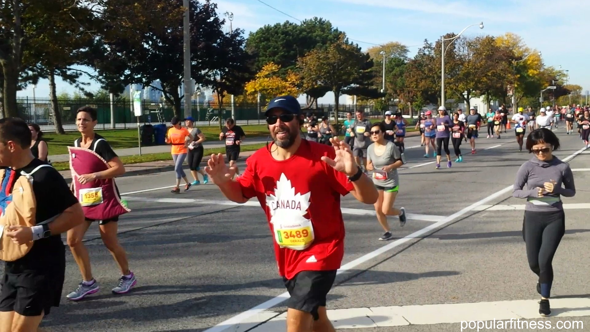 running a marathon in autumn - photo by popular fitness