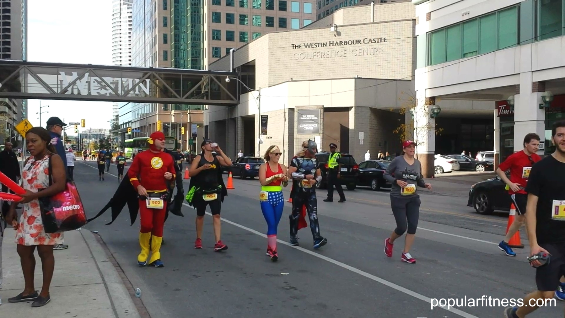 superheroes run Toronto Waterfront Marathon - photo by popular fitness
