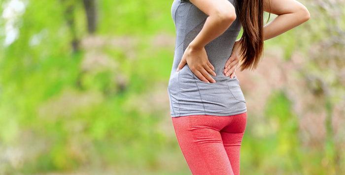 Woman having lower back pain