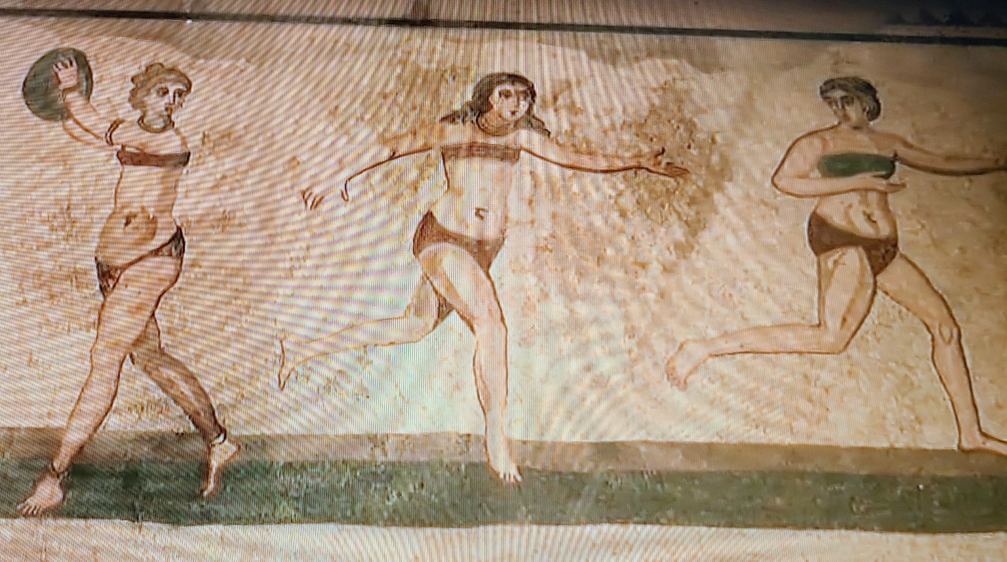 Roman female athletes competing in sports wearing bikinis - Villa Romana del Casale in Sicily