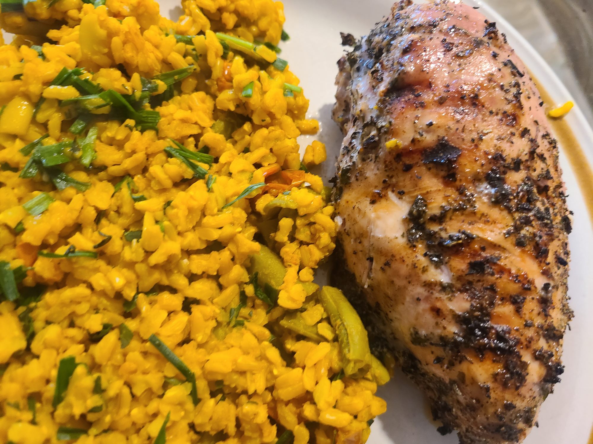 Barbecued chicken breast seasoned with garden herbs - Photo by popular fitness
