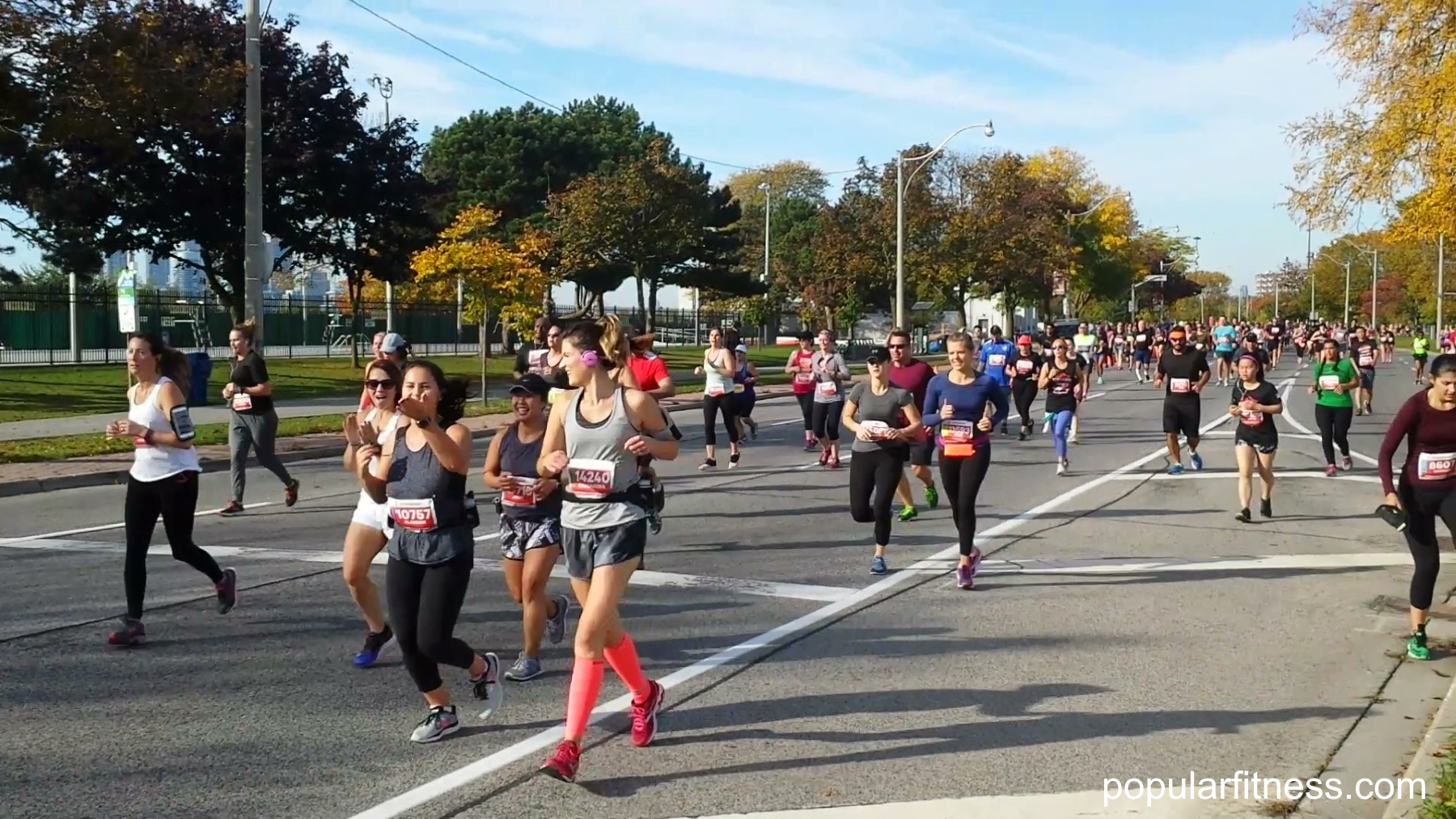 blowing a kiss-Toronto Marathon -  photo by popular fitness