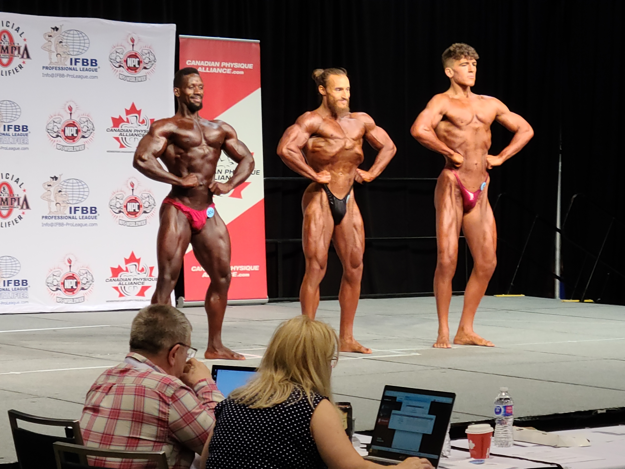 2023 Canfitpro natural championships - bodybuilders posing in bodybuilding competition