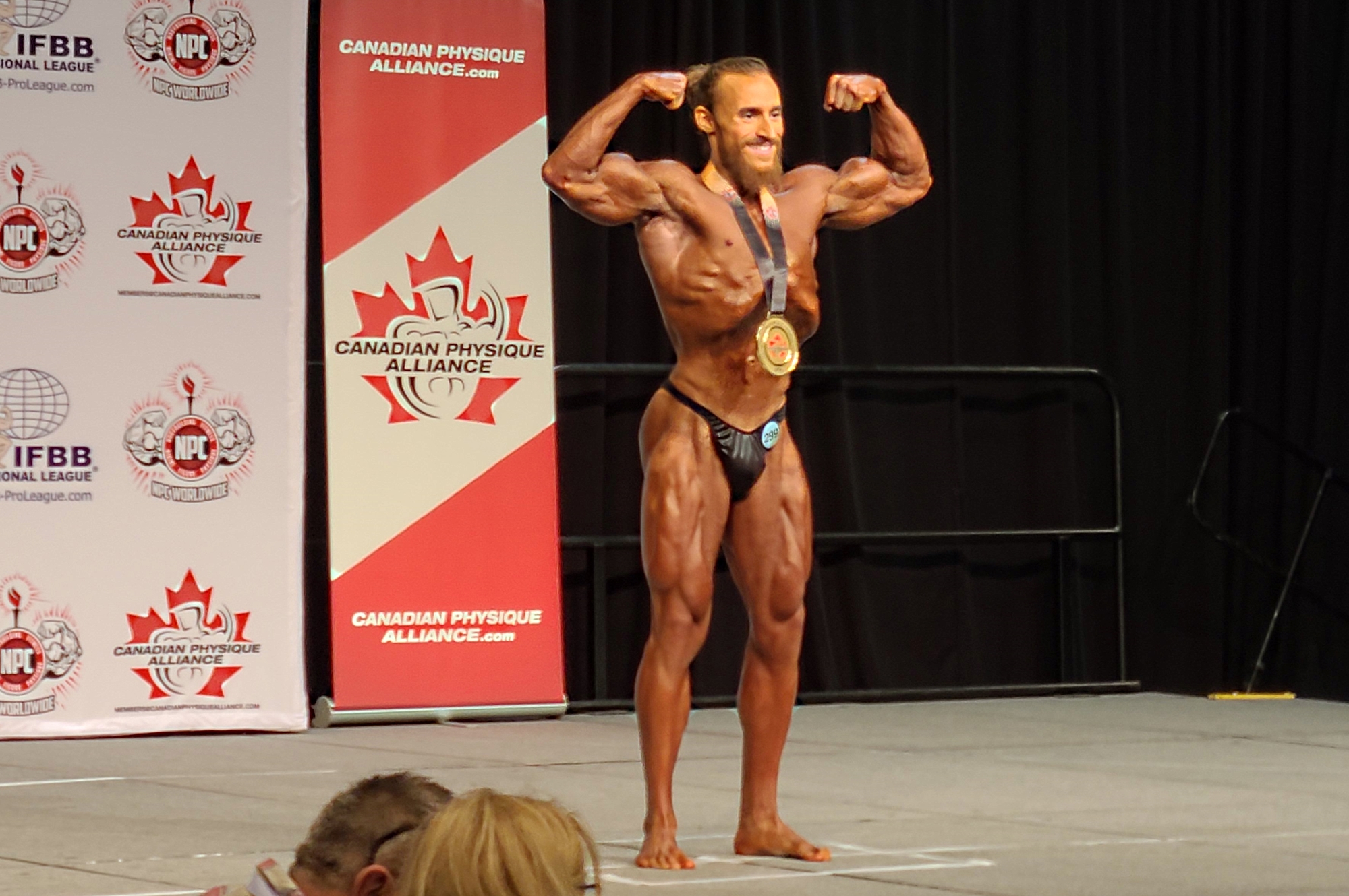 2023 Canfitpro natural championships - bodybuilders posing in bodybuilding competition