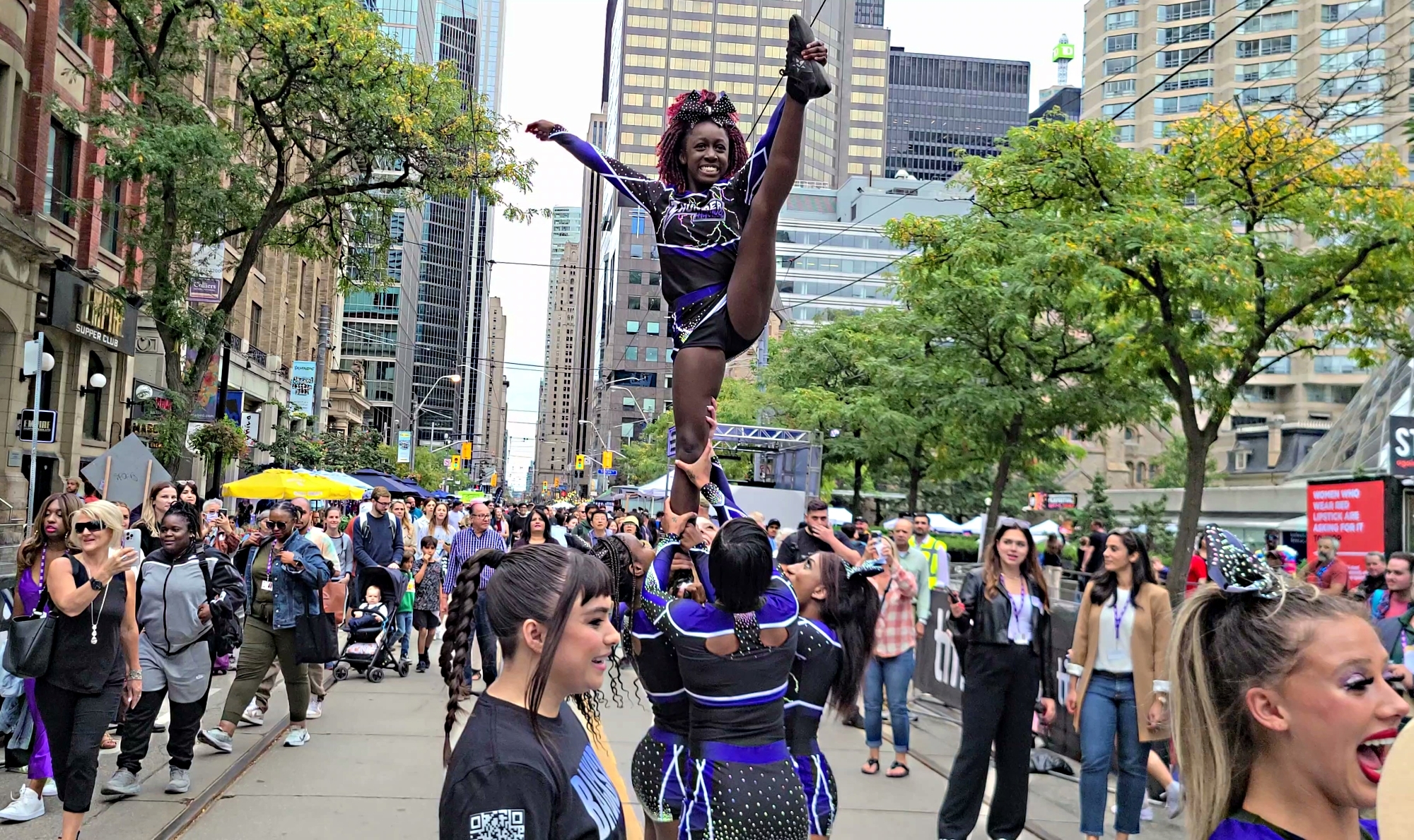 Cheerleaders performing a cheerleading routine for movie Backspot