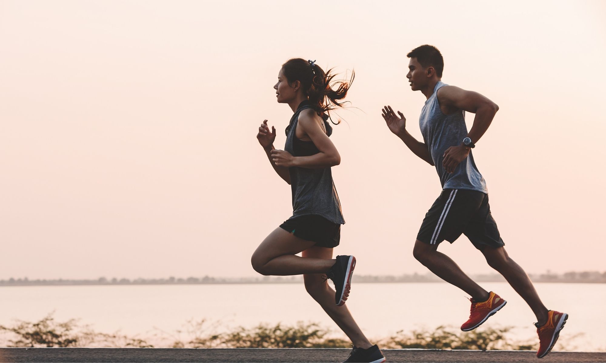 A couple running outdoors together