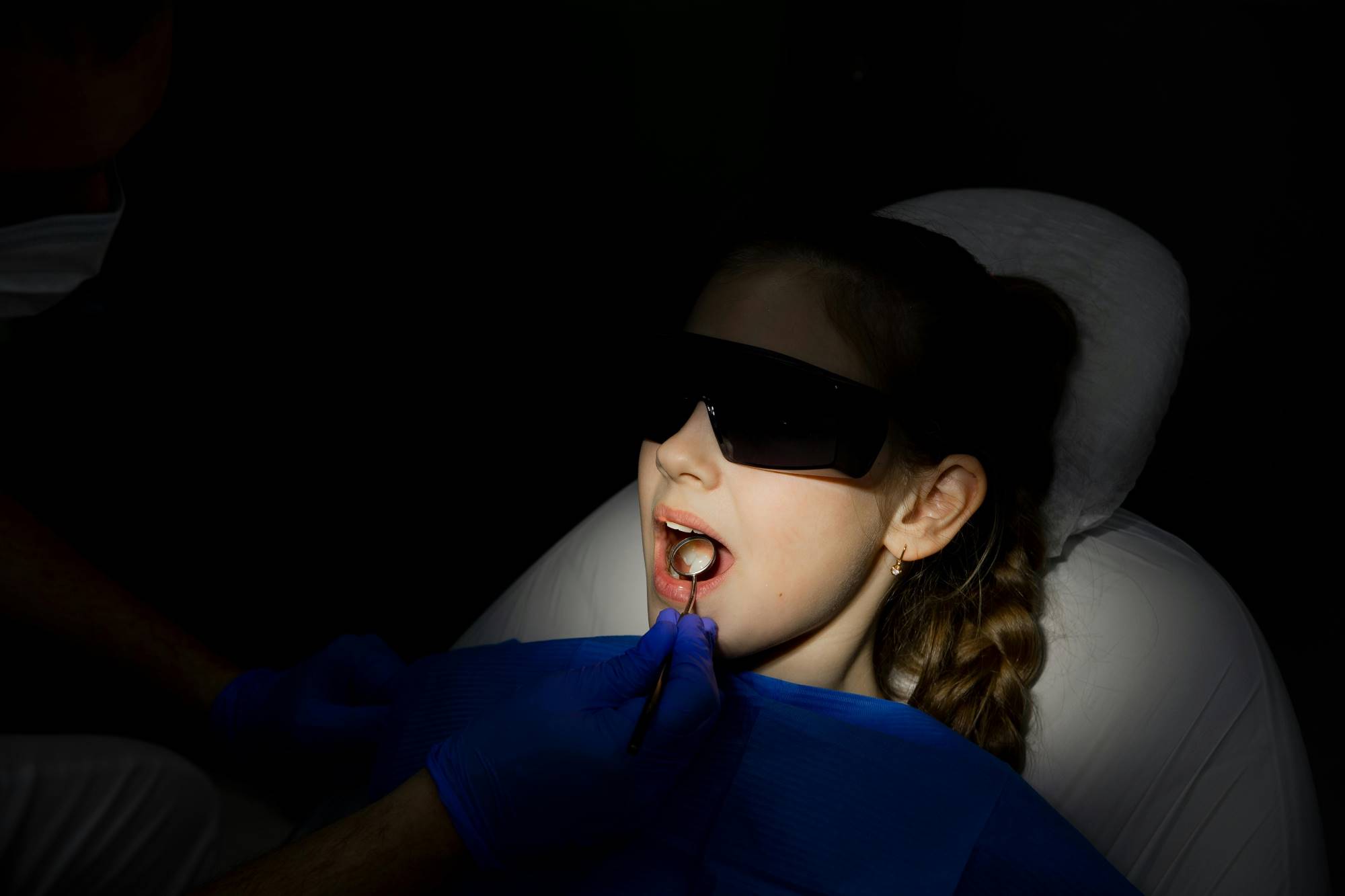 Female patient getting some dental work done