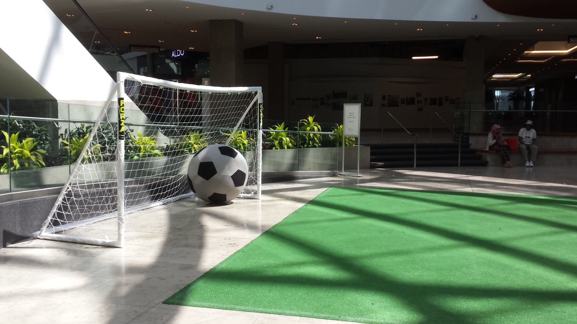 Huge soccer ball -football - on soccer field, footballl pitch