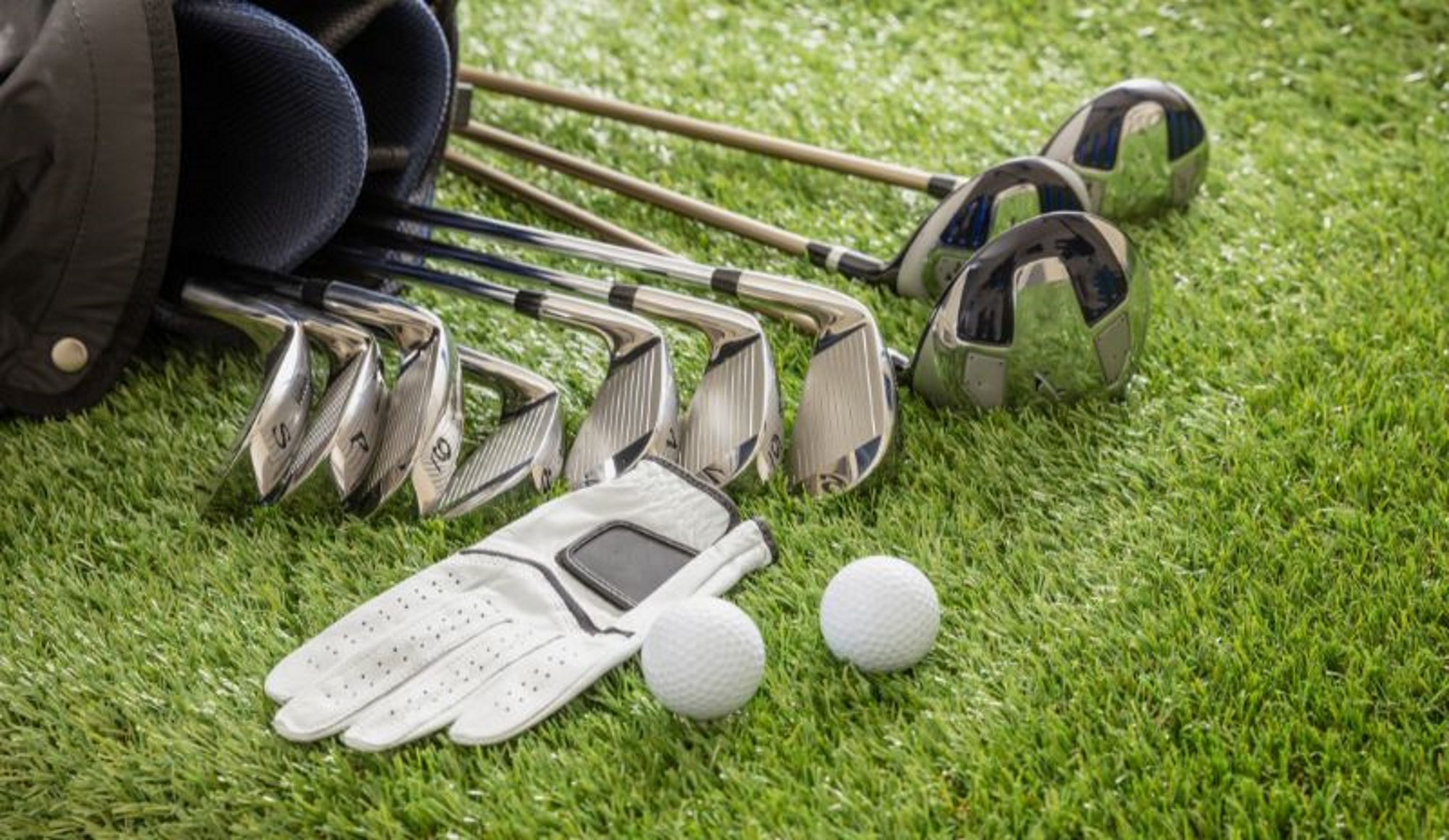 Golf clubs and golfing equipment