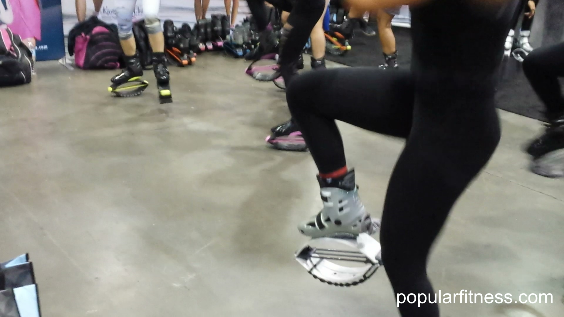 group exercise class wearing kangaroo jump shoes - photo by popular fitness