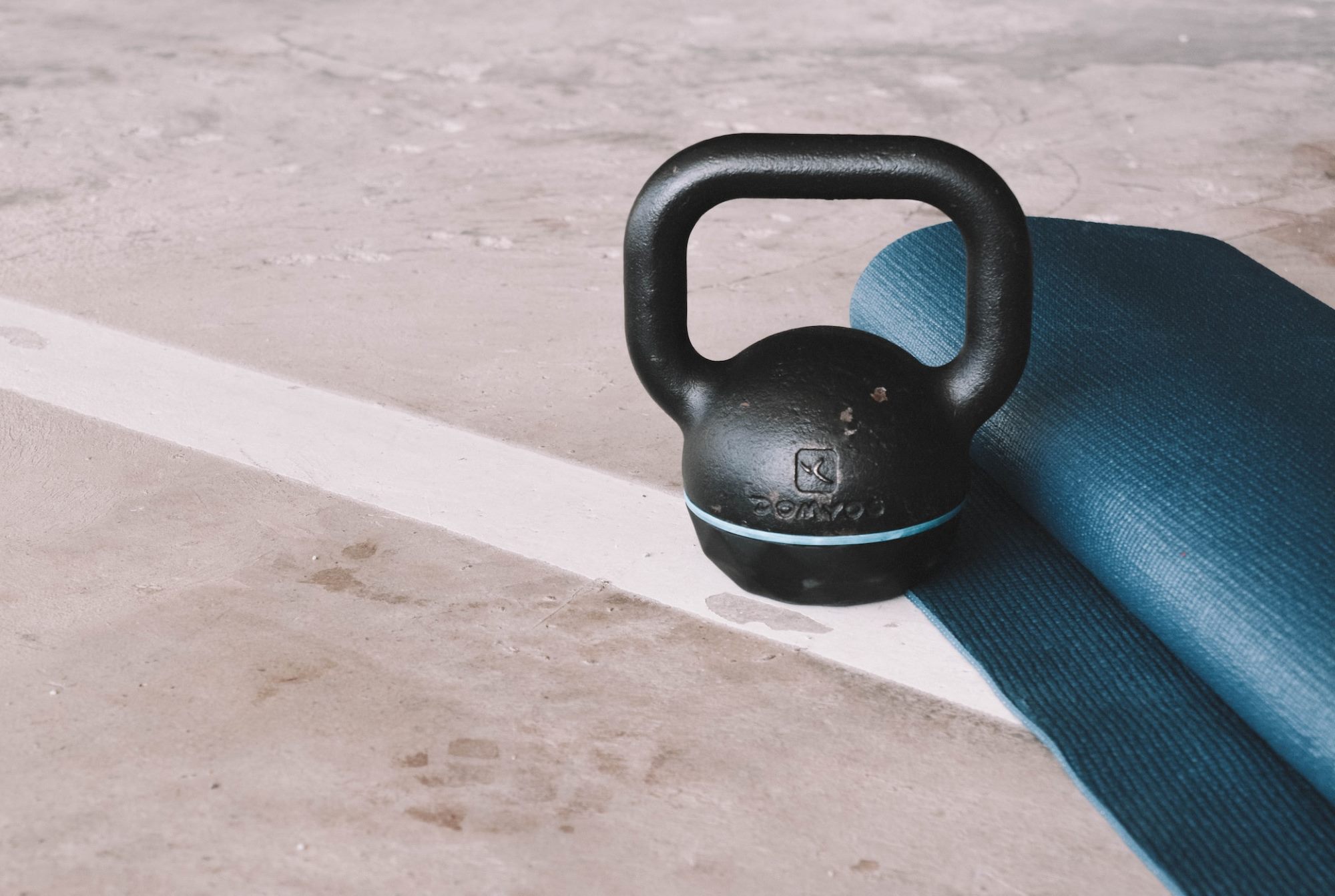 Kettlebell and mat for a home gym