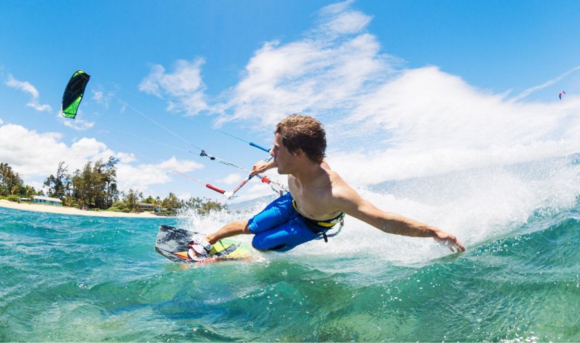 Kitesurfer enjoying the watersport of kiteboarding, kitesurfing