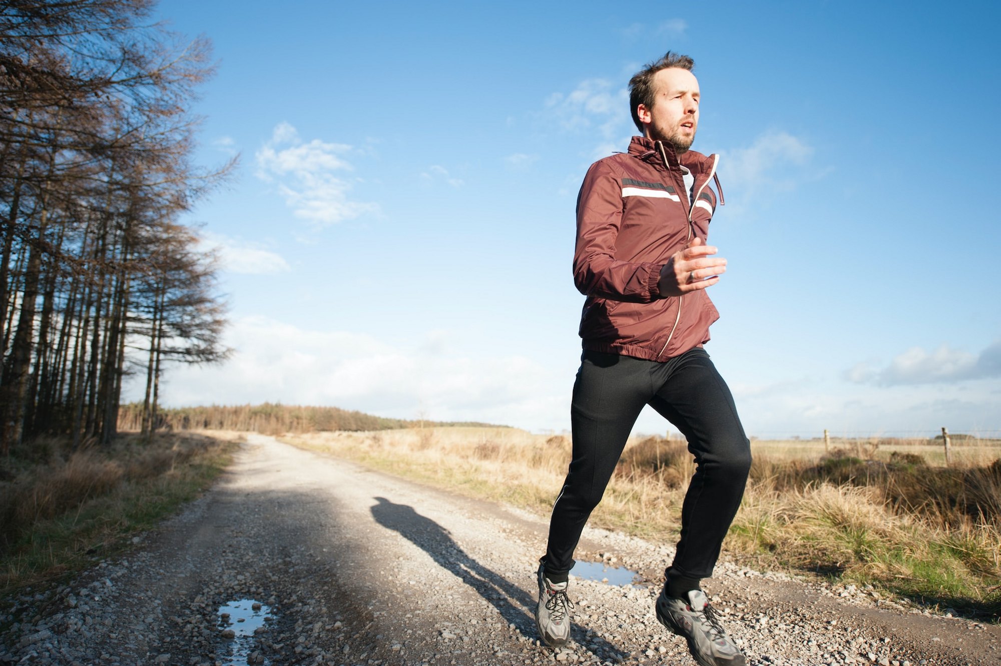 Man running outdoors - warning sighns of prostate cancer