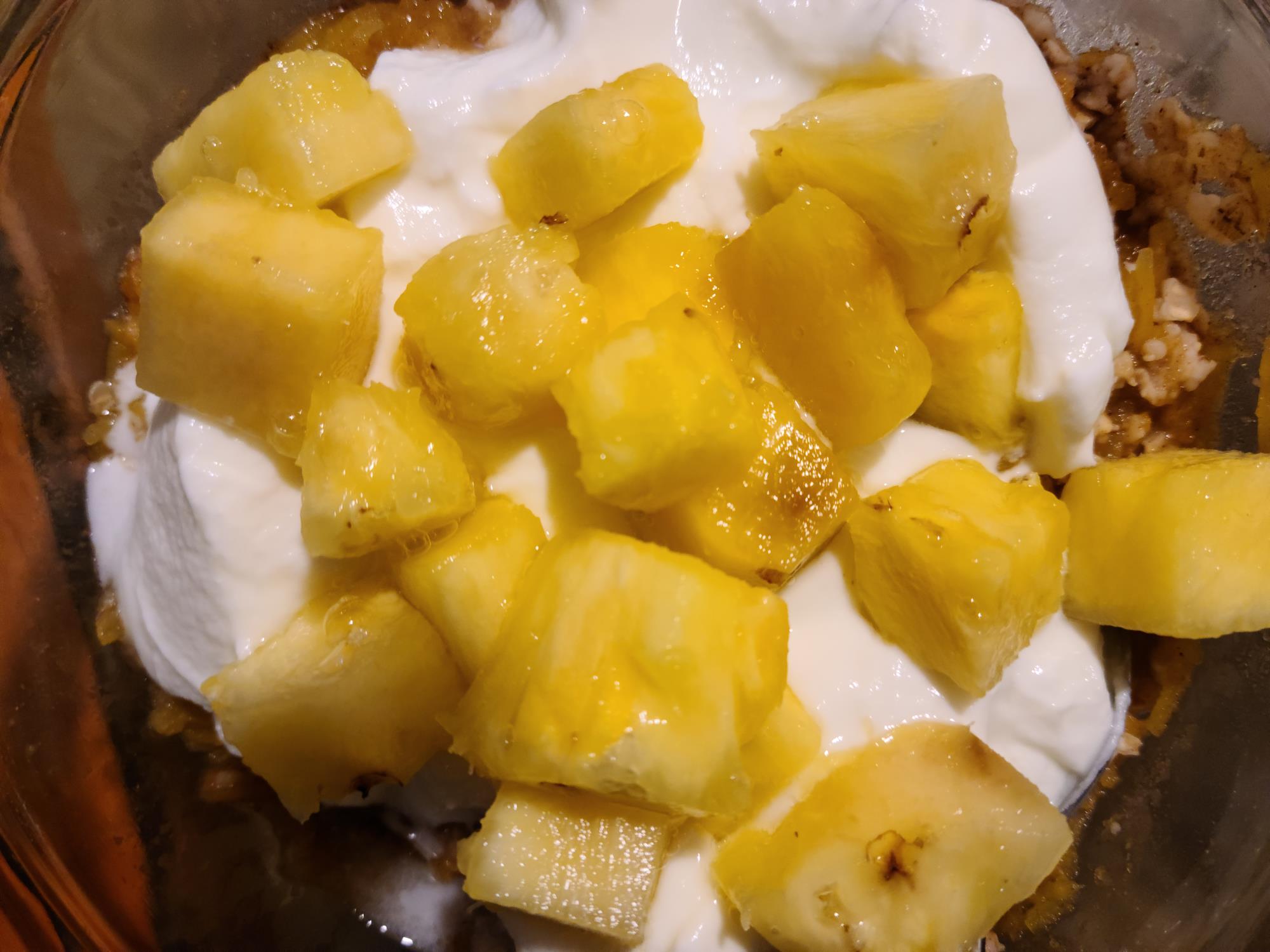 Oatmeal breakfast with pumpkin and pineapple and probiotic yogurt