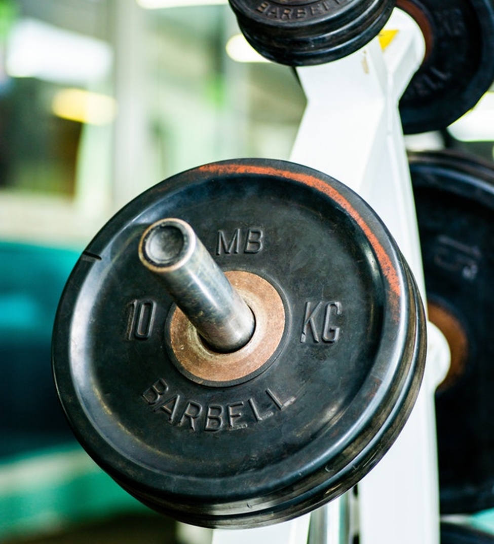 Squat bar on a rack - weight training equipment.