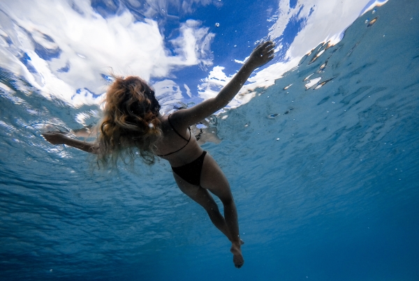 Woman floating in the sea