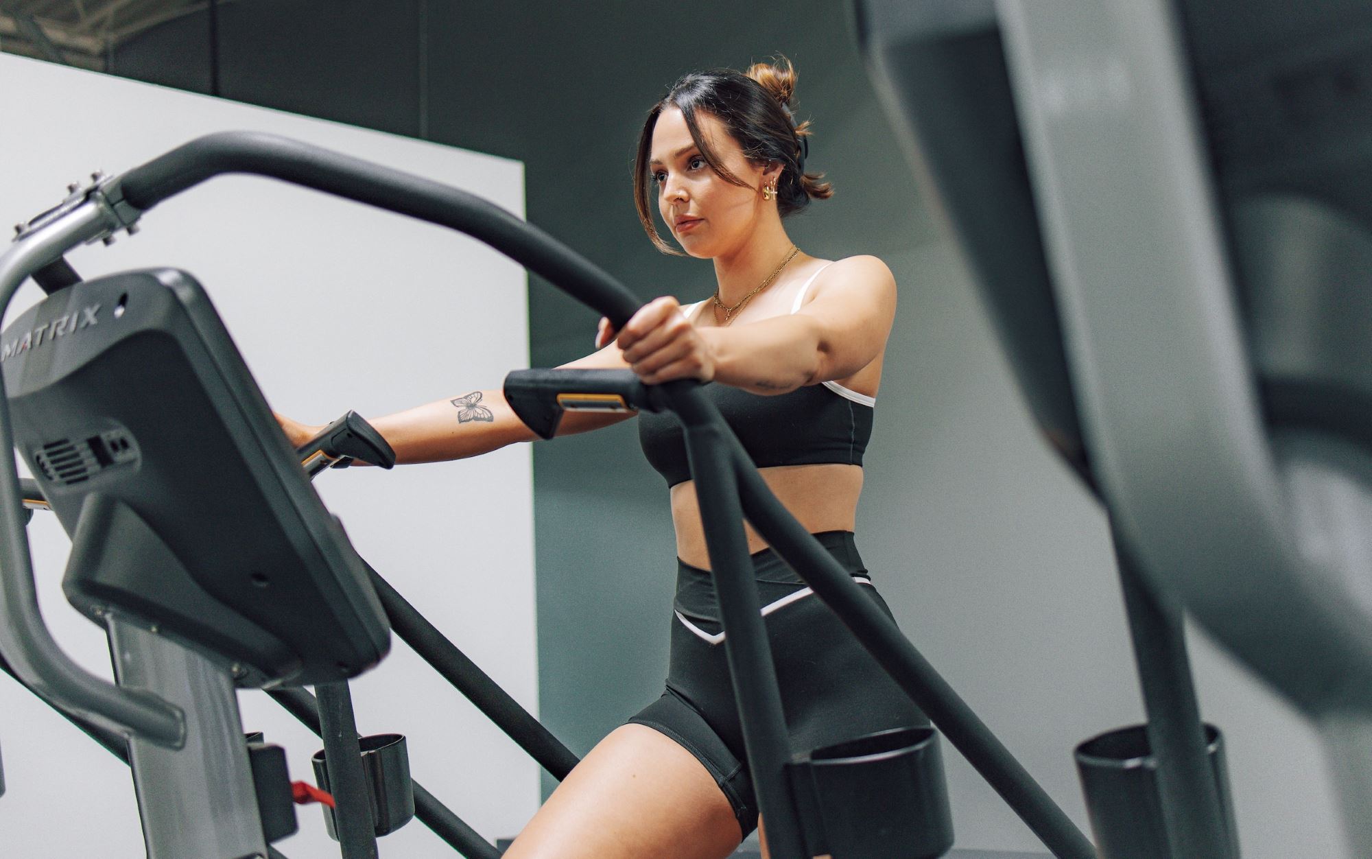 Woman using a treadmill at the gym